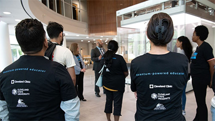 Students listening to a lecture about quantum computing