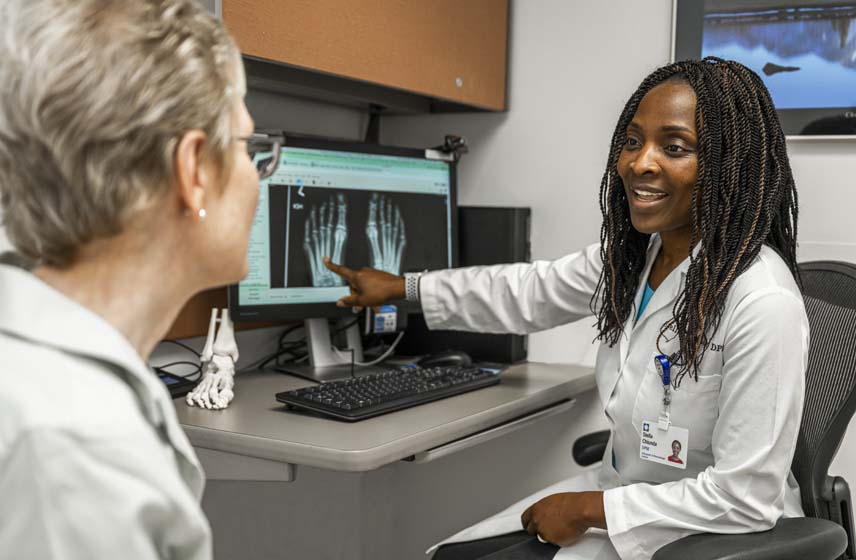 Provider giving an overview of patient X-rays